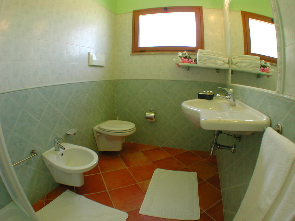 Villaggio Piscina Rei Monte Nai Chambre photo
