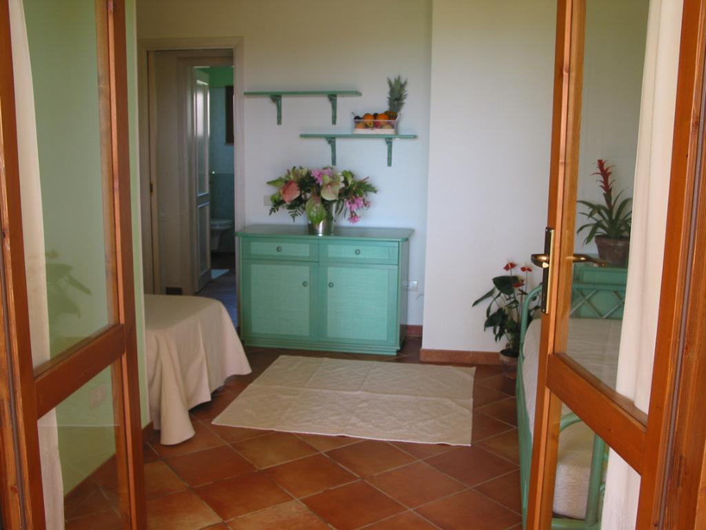 Villaggio Piscina Rei Monte Nai Chambre photo